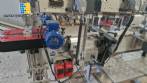 Automatic double head labeling machine for flat bottles Bauch Campos