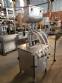 Dosing filling machine for Delgo bottles