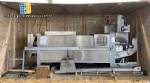 Tetra Pak A3 aseptic filling machine with cardboard packer 70 and tray shrink 51.