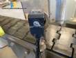 Automatic self-adhesive labeling machine for cylindrical bottles
