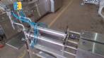 Semi-automatic pneumatic liquid filling machine with two nozzles