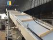 Inclined conveyor belt with talisca