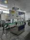 Linear filling machine with 12 filling nozzles