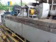 Conveyor oven with direct flame