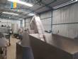 Complete filling line with Tecman Nelpas Tecnoenvase Tudela bottle filling, labeling, capping, and positioning machines for cosmetic liquids.