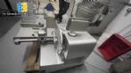 Bizerba automatic stainless steel slicer for cheeses, cold cuts, sausages, and meats.