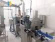 Line for brine filling manual product insertion and automatic capping