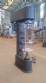 Filling machine with 2 nozzles for liquids and pilfer cap screwer