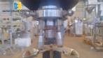Filling machine with 2 nozzles for liquids and pilfer cap screwer