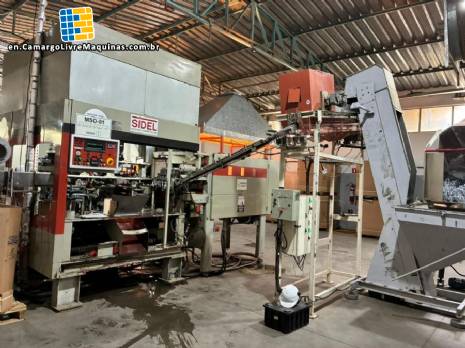 Sidel PET bottle blow molding machine, 4,000 bottles per hour.
