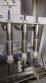 Linear filling machine with stainless steel threading machine 12 Narita nozzles