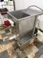 Stainless steel meat grinder with size 98 opening.