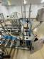 Automatic stainless steel filling machine for a�a� jars, Bramak ice cream
