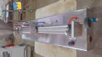 Semi-automatic filling machine for liquids and pasties with 1 nozzle