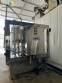 Packaging line with IMSB bung capper, Maqmundi labeler and accumulator table