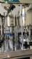 Packaging line with IMSB bung capper, Maqmundi labeler and accumulator table