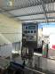 Automatic labeling machine for flat cylindrical bottles and jars Maqmundi