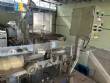 Automatic labeling machine for flat cylindrical bottles and jars Maqmundi