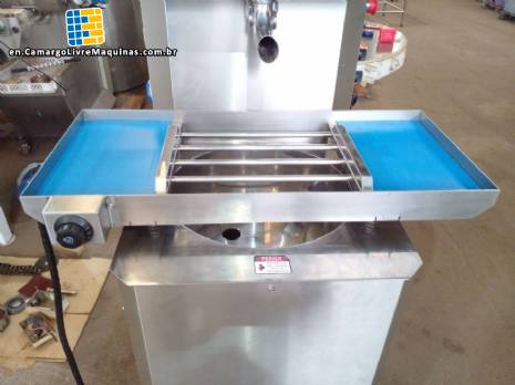 Continuous tempering machine with Vonin vibrating table