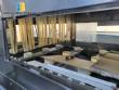 Filling line for 10 and 20 liter gallon jugs with filling machine and rinser/washer.
