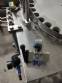Bottle screw filler with 3 nozzles