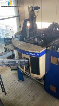 PET bottle blow molding machine with 3 cavities, SIG model, 3,500 bottles per hour.