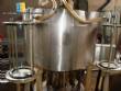 Rotary filling with 12 automatic nozzles Wada