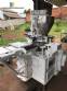 Machine for pressing and wrapping meat broths Corazza