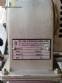 Tempering machine with cover plate coupled to Sidmaq