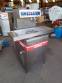 Tempering machine with cover plate coupled to Sidmaq