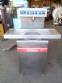 Tempering machine with cover plate coupled to Sidmaq