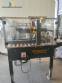 Adhesive tape case sealer with safety enclosure and door sensors Strapack