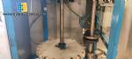 Bottle and jar screwing machine with automatic cap feeding system