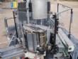 Krones automatic rotary label applicator for paper labels.