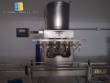 Linear filling machine with 14 nozzles with rinser and screw capper