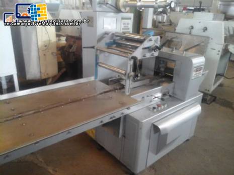 Varied flow pack wrapping machines