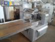Varied flow pack wrapping machines