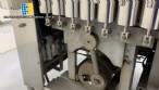 Linear filling machine with 7 filling nozzles