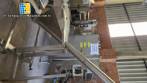 Inclined screw conveyor with stainless steel silo