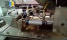 Filling machine for sachet with two dosers