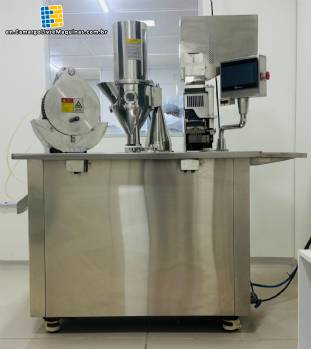 Capsule encapsulator, counter and polisher, capacity 22,000 capsules per hour.