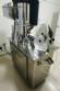 Capsule encapsulator, counter and polisher, capacity 22,000 capsules per hour.