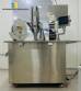 Capsule encapsulator, counter and polisher, capacity 22,000 capsules per hour.