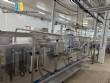 Horizontal stainless steel packaging machine for Profills stand-up pouch packaging.
