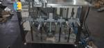 Linear filling machine with 6 pistons filling system