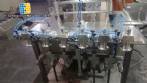 Linear filling machine with 6 pistons filling system