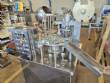 Semi-automatic filling machine for pots with aluminum lids NTI