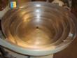 Positioner for vibratory feeder for double time