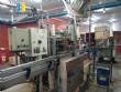 CompoMaq rotary filling machine with 42 nozzles and screw capper
