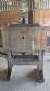 Labeling machine with steam sleeve tunnel and bottle baler